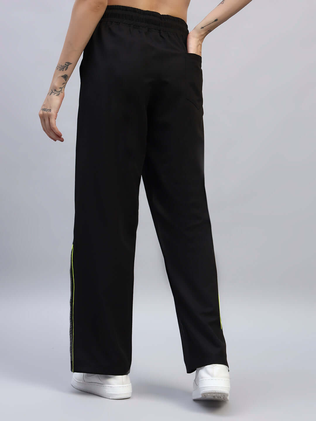 Back view of Women's Salvo Reflector Relaxed-Fit Joggers in black, showcasing the comfortable fit and sleek design.