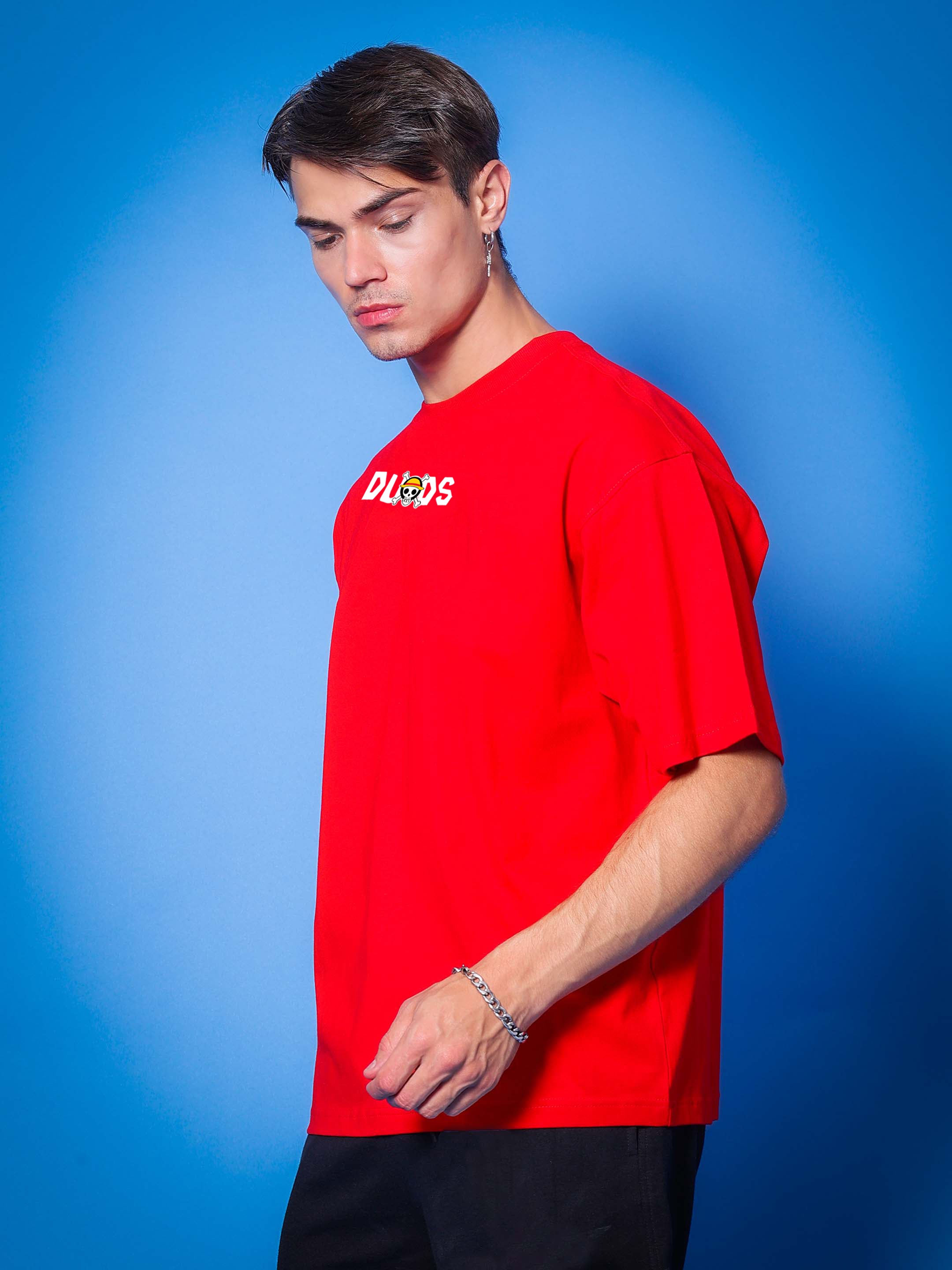 Model wearing ONE PIECE OVER-SIZED T-SHIRT RED from DUDS collection