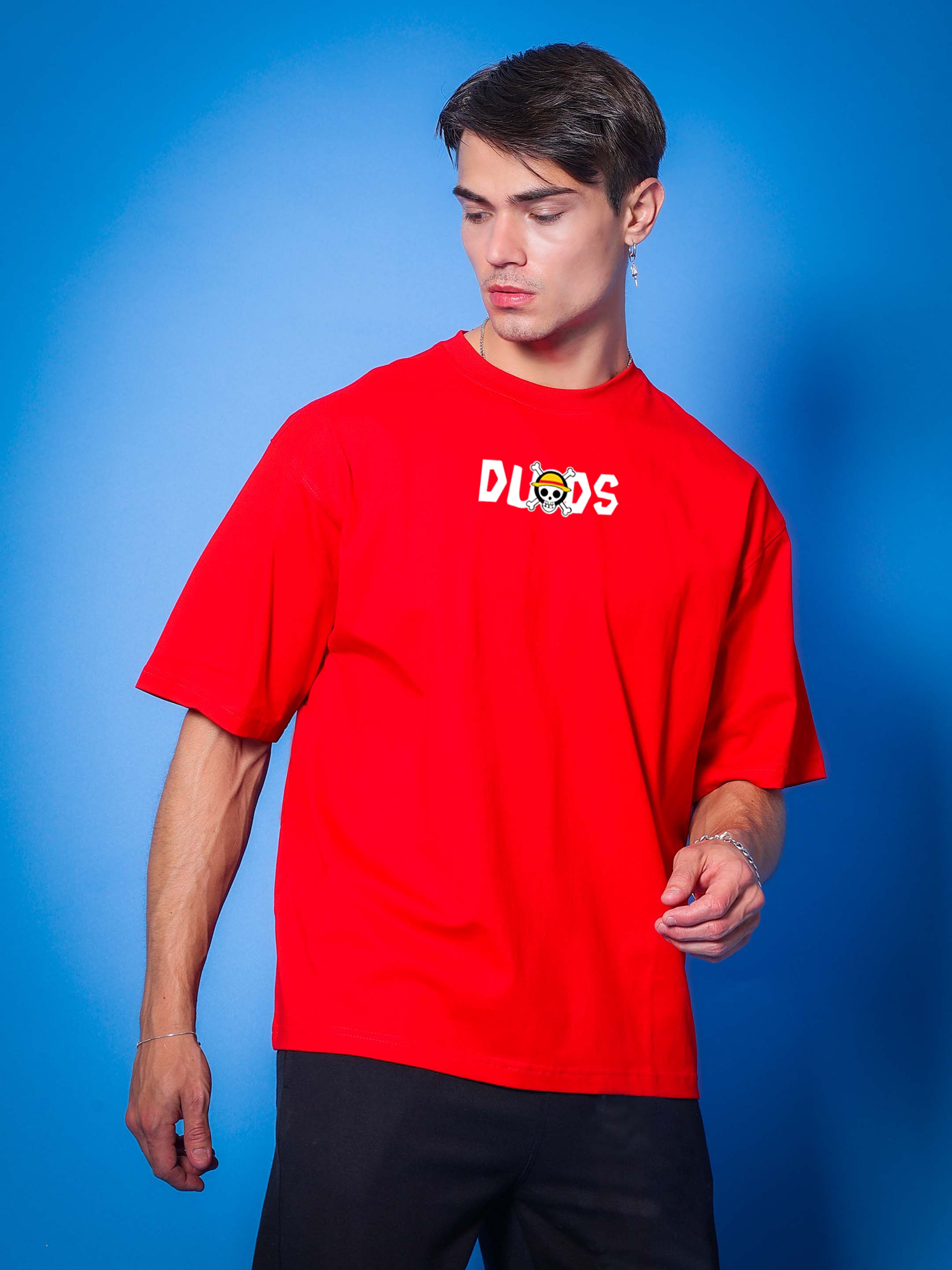 Red ONE PIECE OVER-SIZED T-SHIRT by DUDS worn by model, available in custom fit options, ideal for casual fashion.
