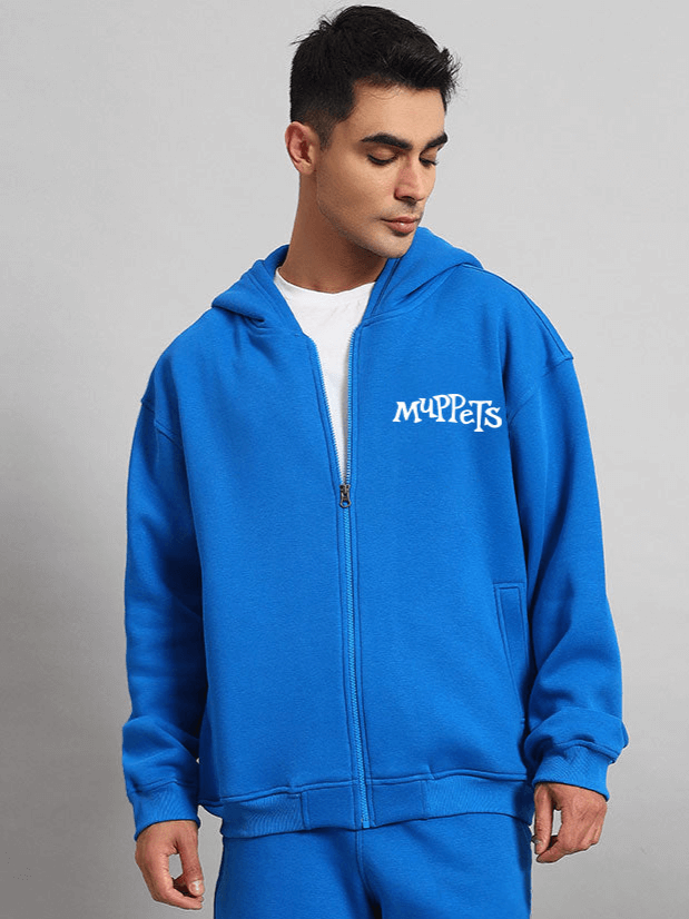 Man wearing a blue Muppets hoodie from DUDS, customized fit available for prepaid orders.