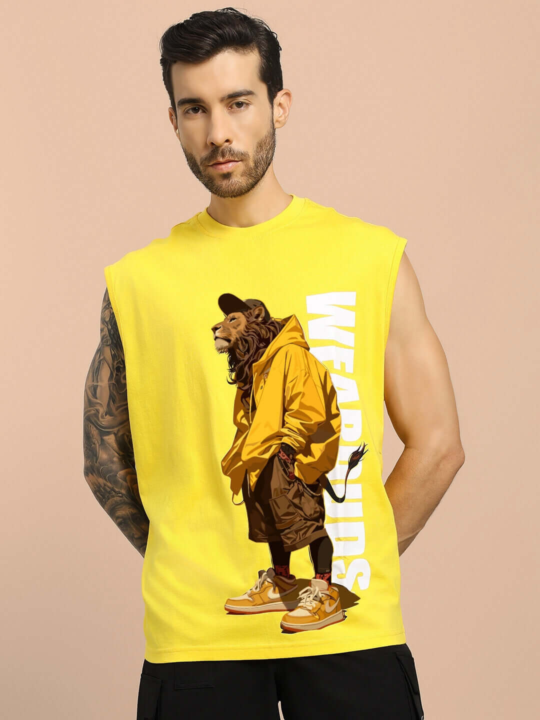 Man wearing yellow STREET LION GYM T-shirt with lion graphic, ideal for workouts. Offers custom sizing, available for prepaid orders.