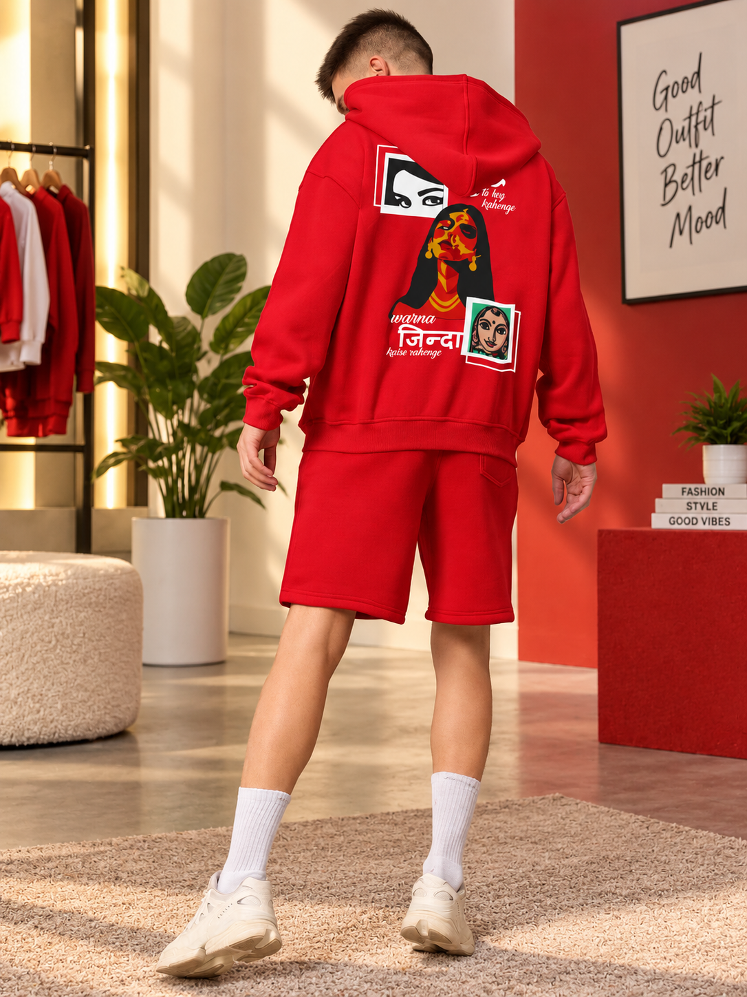 A LOOK ATTITUDE FLEECE CO-ORD RED hoodie and shorts set with bold graphic print, worn by model in stylish red room