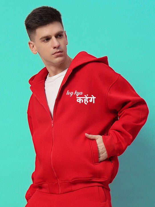 Model wearing A LOOK ATTITUDE FLEECE HOODIE RED with text on the front, against a turquoise background.