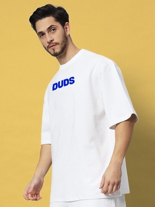 ABSENT PRESENT OVER-SIZED T-SHIRT WHITE worn by model on mustard background