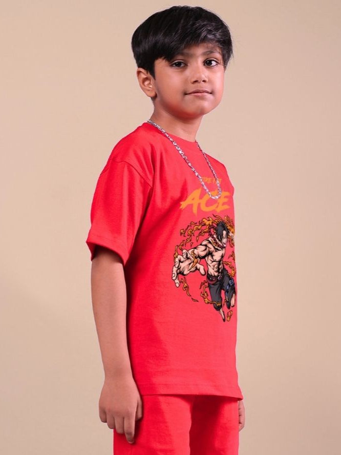 Child wearing ACE red unisex t-shirt, featuring bold design. Ideal for boys and girls, offering style and comfort in vibrant red.