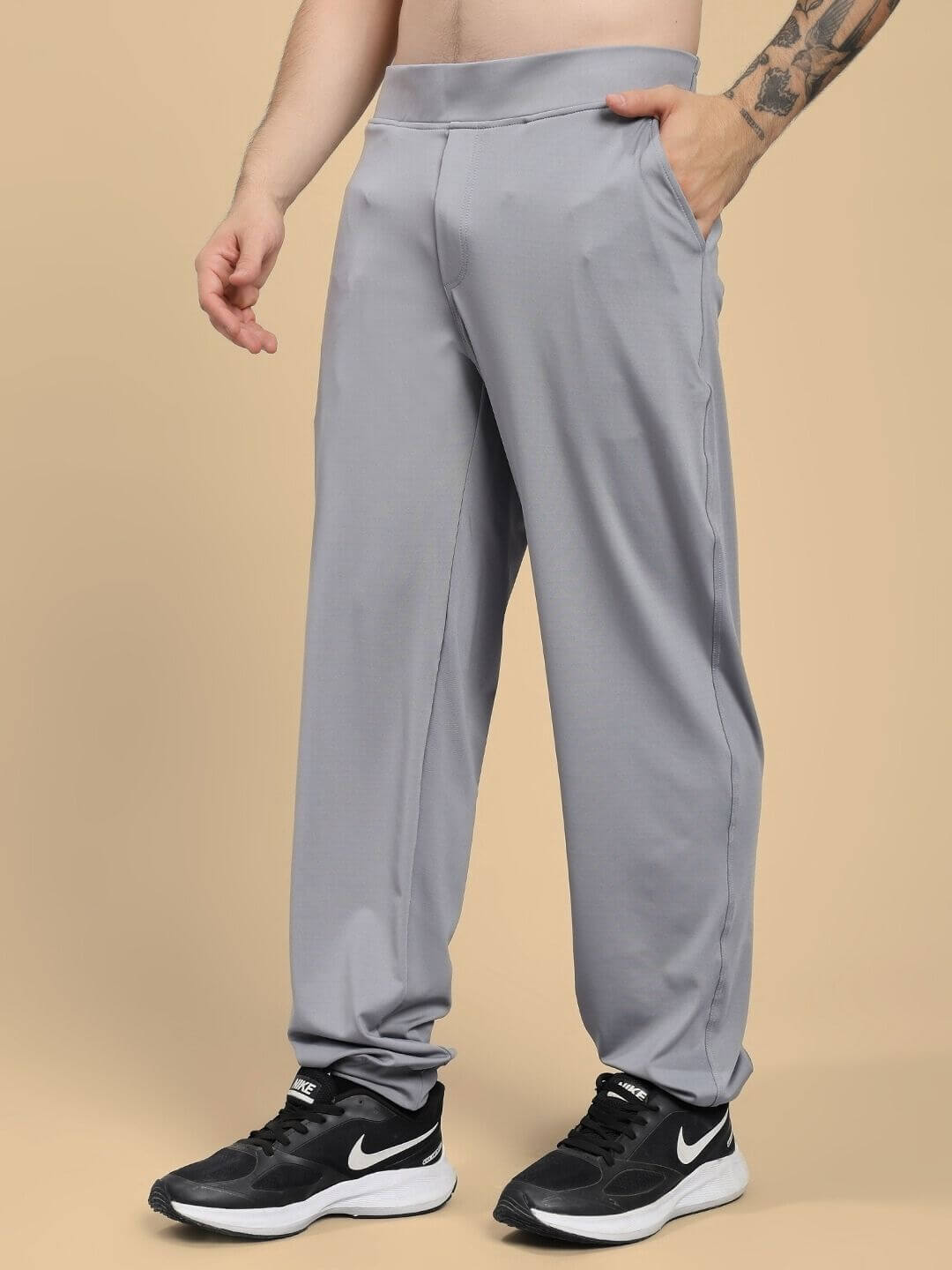 Person wearing ACTIVE FLEX RELAXED FIT JOGGER GREY with soft, breathable fabric, showcasing comfortable, tapered fit for active lifestyle.