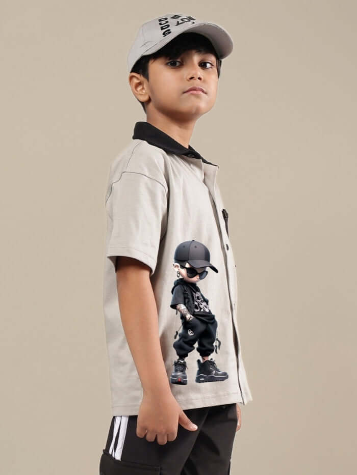 Child wearing ADORABLY SHIRT FOR BOYS GIRLS GREY-BLACK with graphic design and cap