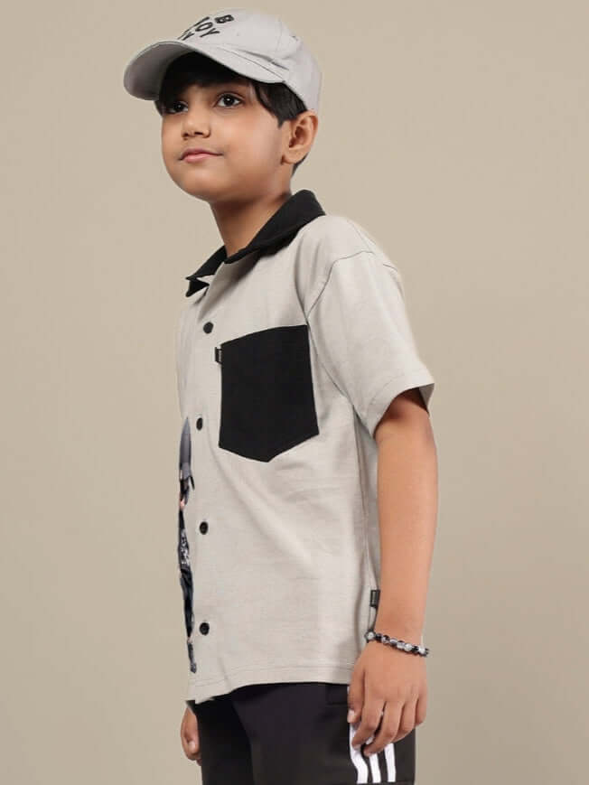 Child wearing ADORABLY SHIRT FOR BOYS GIRLS GREY-BLACK with black accents, showcasing comfortable and stylish design.