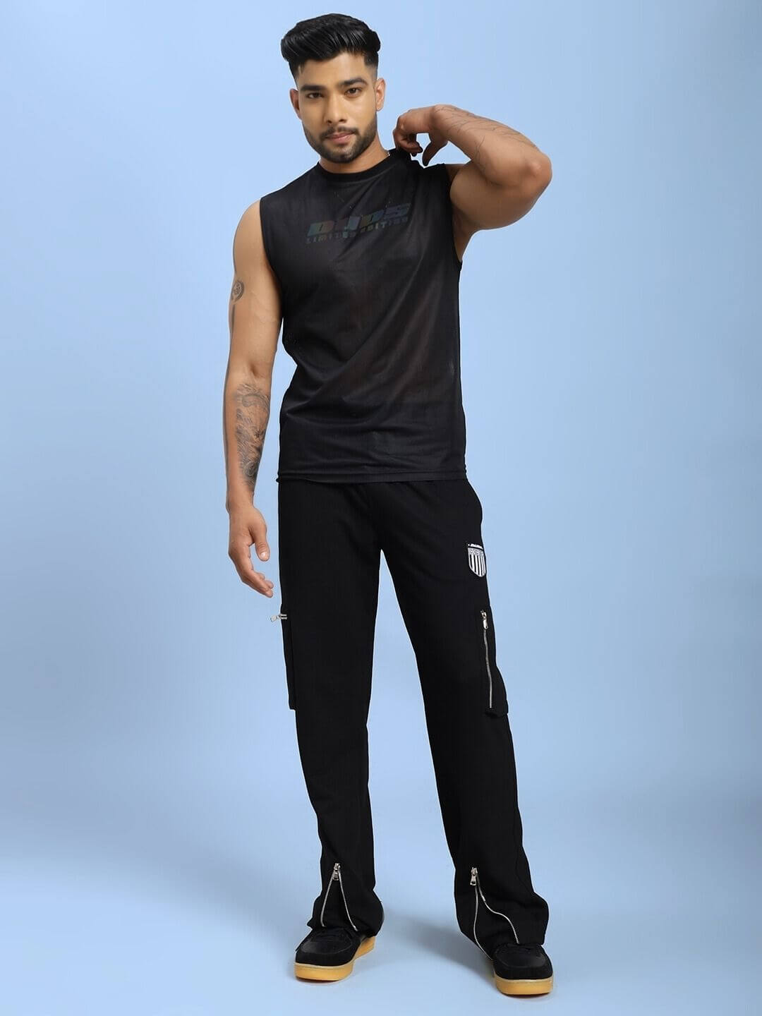 Model wearing AIR-FLOW REGULAR FIT T-SHIRT BLACK showcasing breathable and moisture-wicking properties, ideal for gym or casual wear.