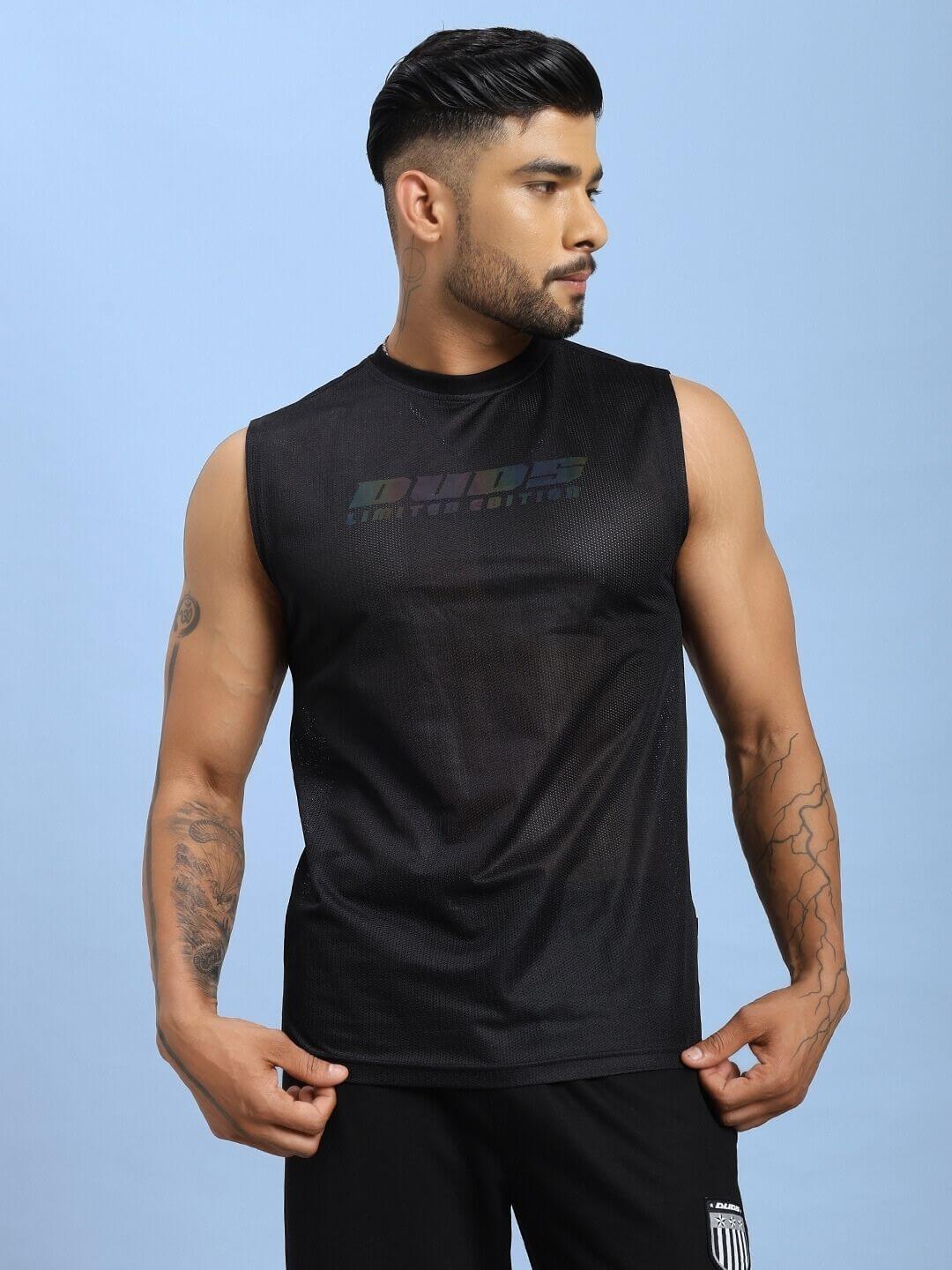 Man wearing AIR-FLOW REGULAR FIT T-SHIRT BLACK demonstrating comfort and breathability of the advanced Air-Flow fabric technology.