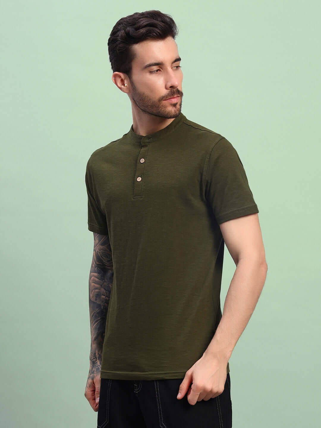 Man wearing ALBET Regular Fit T-Shirt in Olive Green, made from premium heavy cotton slub fabric, suitable for casual wear.