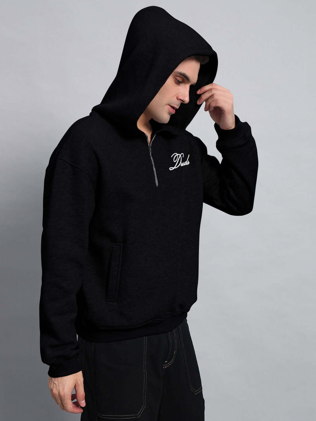 WEARDUDS AMARILLO FLEECE HOODIE BLACK worn by model against gray background