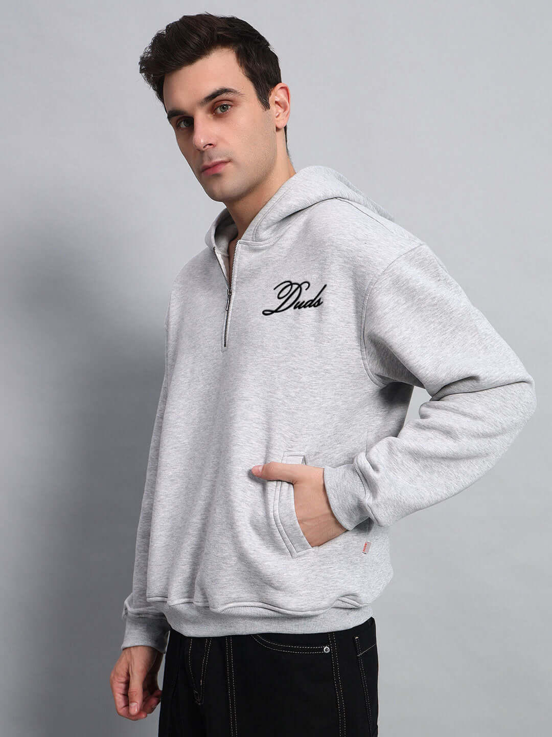 AMARILLO FLEECE HOODIE MELANGE GREY displayed by model, made to order garment from DUDS, customizable size option available.