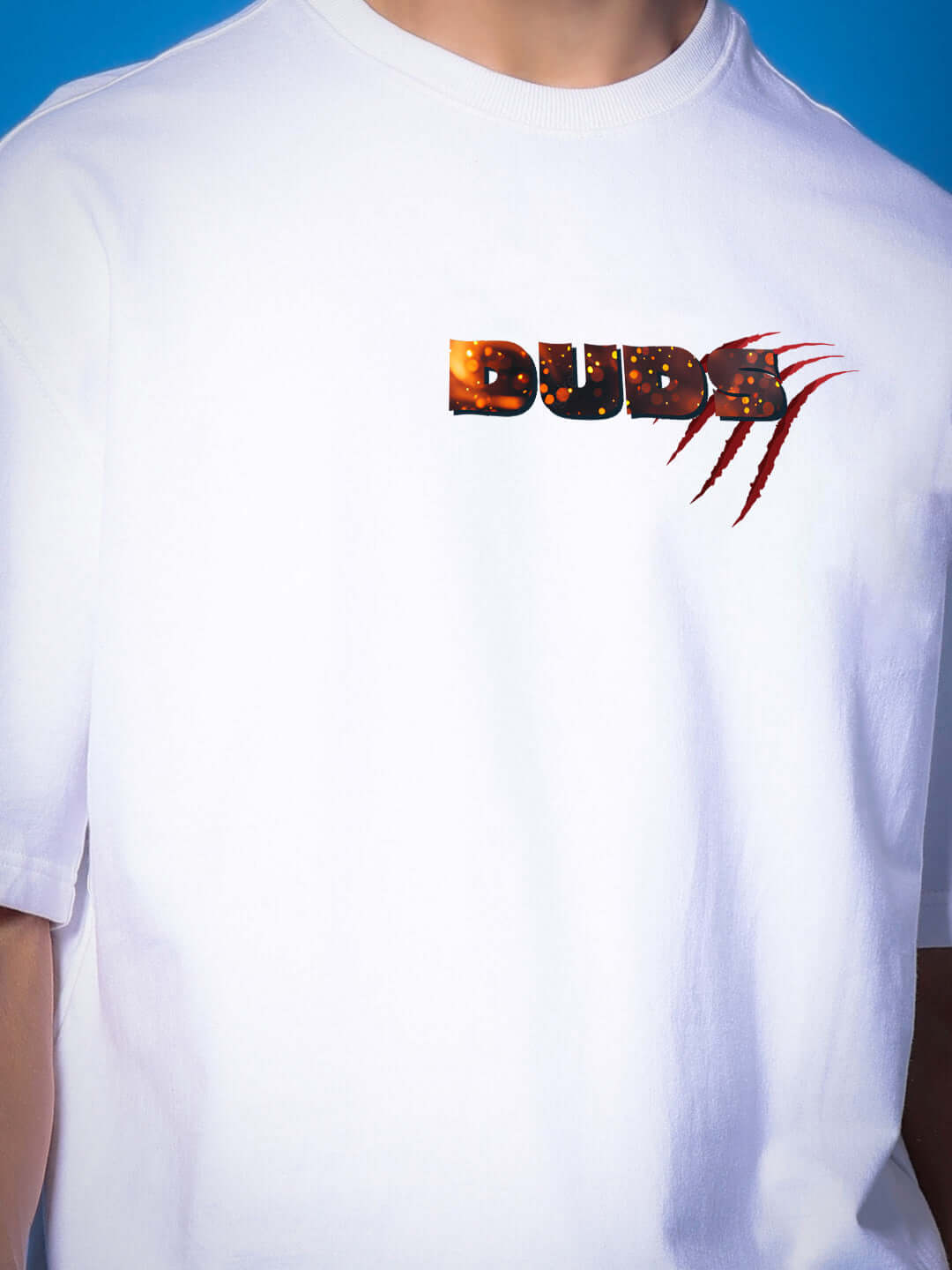 Model wearing ANGRY PANTHER OVERSIZED T-SHIRT WHITE with bold graphic text and claw design, showcasing street-style edge.