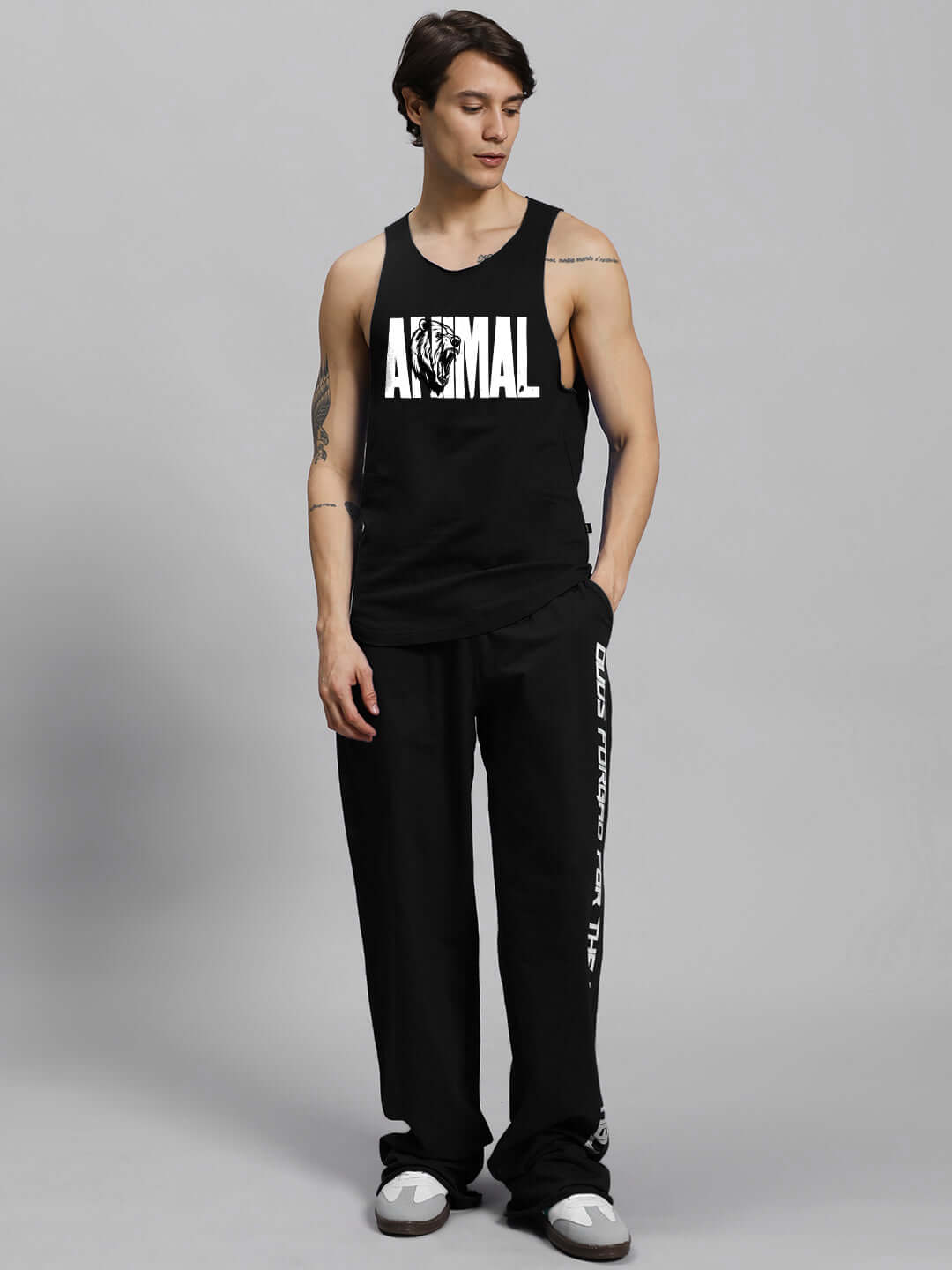 Unisex ANIMAL PRINTED RELAXED FIT CO-ORD SET BLACK with joggers and tank top, 100% cotton, perfect for casual wear.
