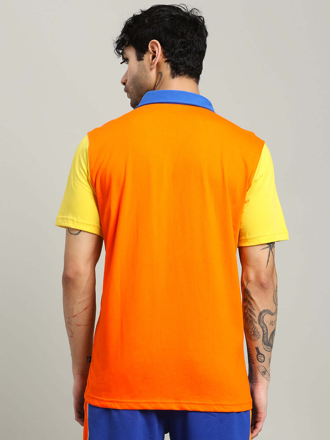 Back view of APEX REGULAR FIT SHIRT MULTI ORANGE, showcasing vibrant colors and contemporary design for men's fashion.