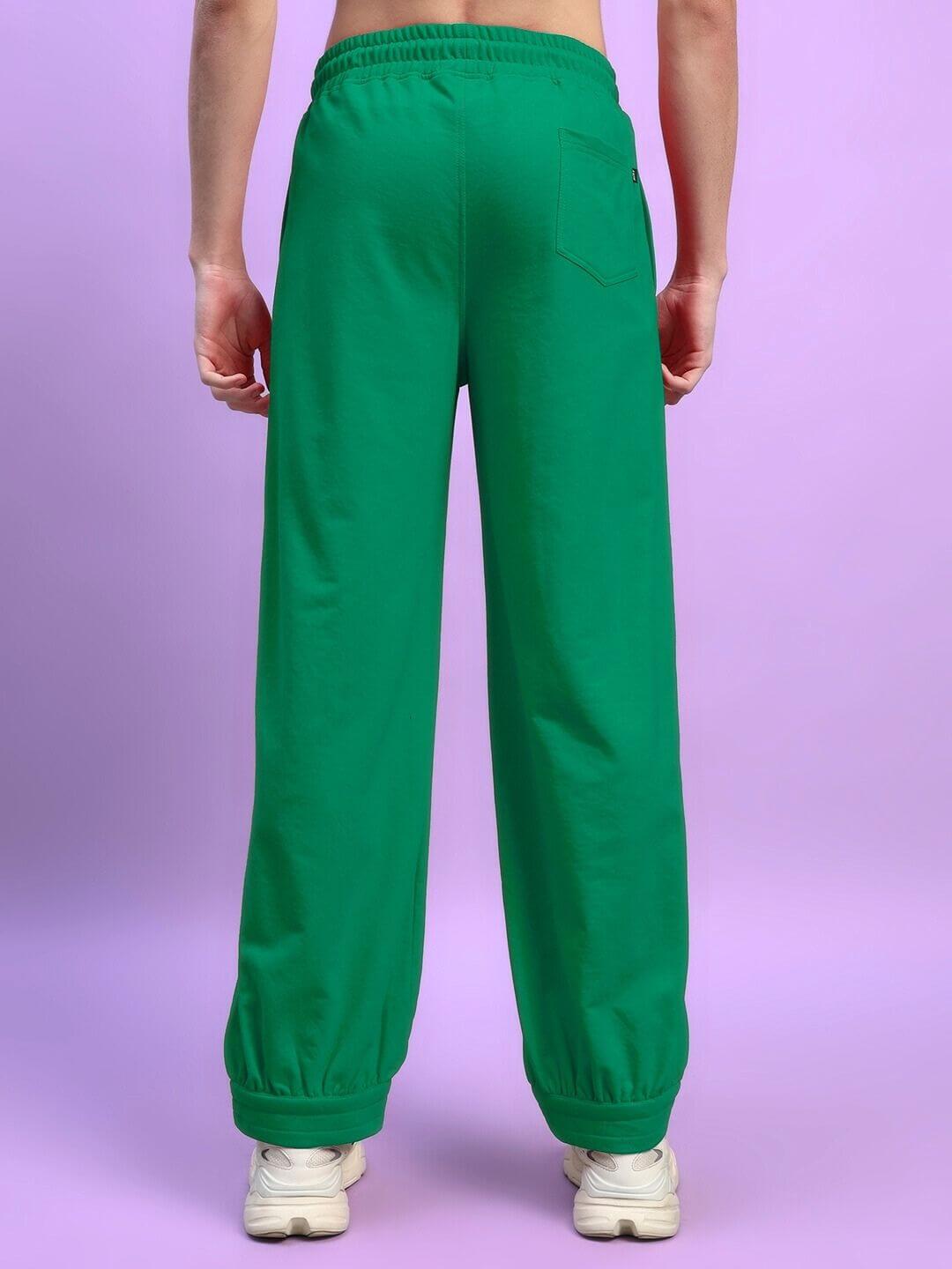 Back view of AUSTRIAN RELAXED-FIT JOGGERS GREEN showcasing relaxed silhouette and bold color.