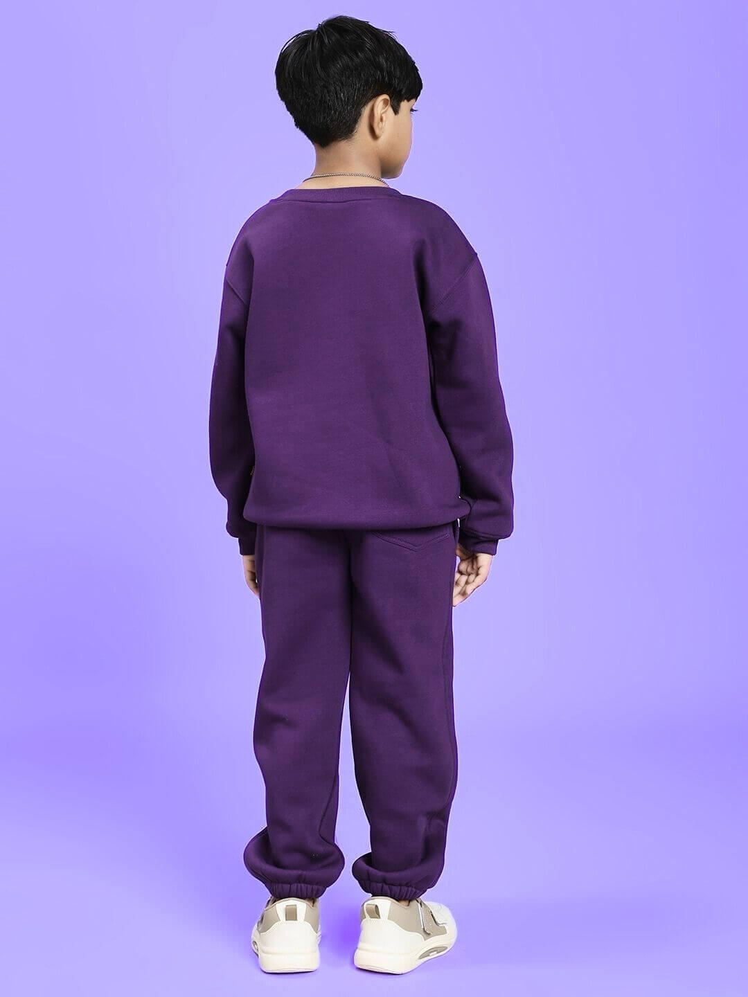 AUTHENTIC RIDER FLEECE CO-ORD FOR BOYS AND GIRLS PURPLE outfit shown from the back on a child, highlighting the design.