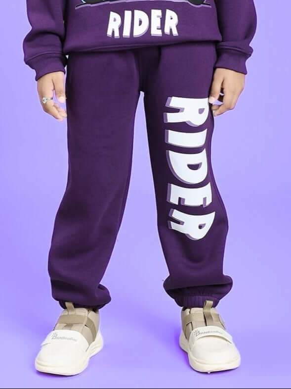 Purple AUTHENTIC RIDER FLEECE JOGGER FOR BOYS AND GIRLS displayed with bold rider text on leg.