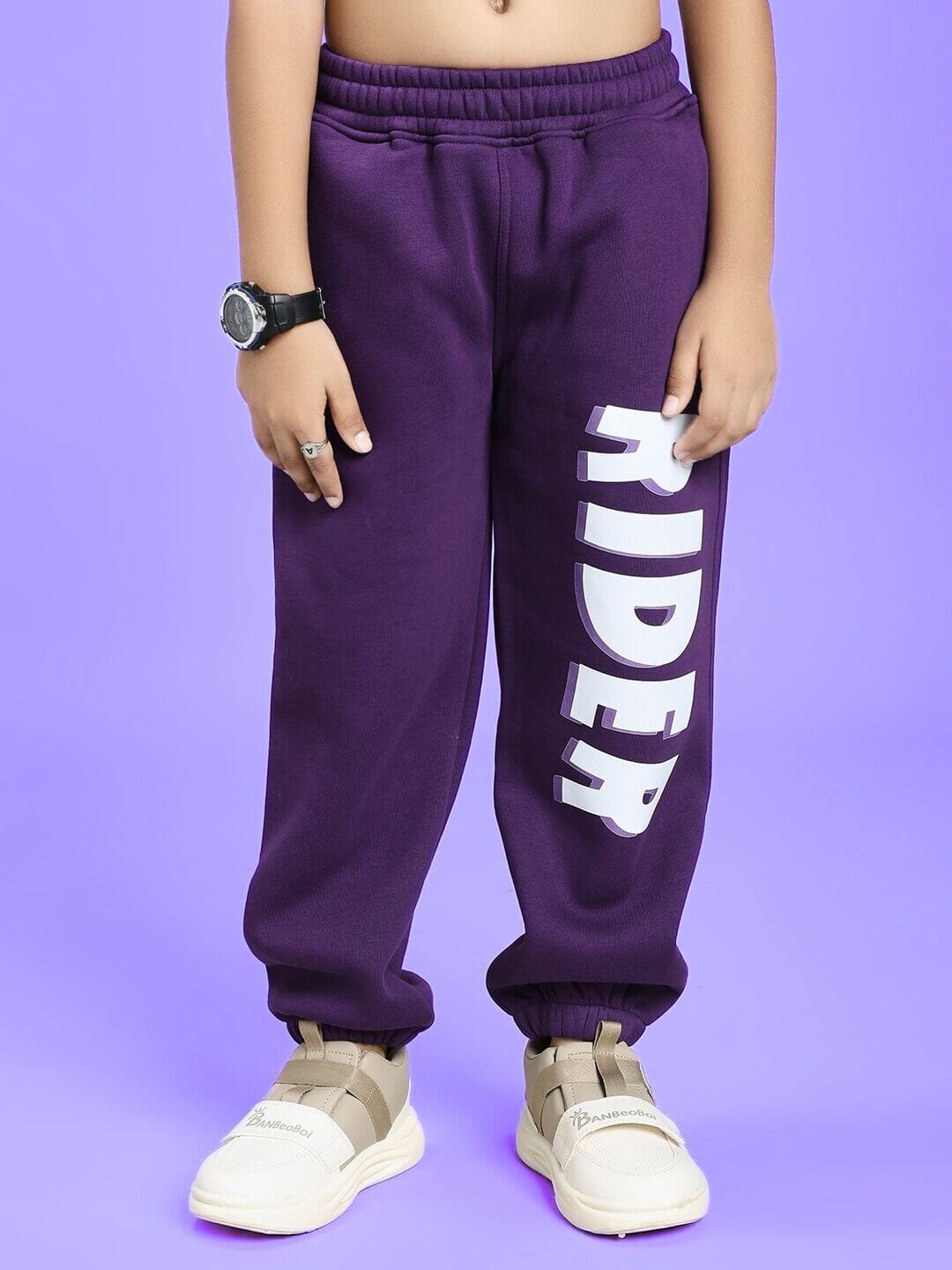 Alt Tag: AUTHENTIC RIDER FLEECE CO-ORD FOR BOYS AND GIRLS PURPLE, casual pants showing "RIDER" text in bold on side, comfortable fashion.