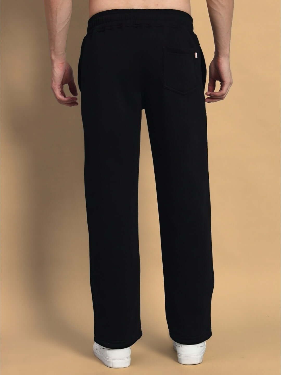 Back view of model wearing AVIATOR FLEECE CARGO PANT BLACK from WEAR DUDS, showcasing premium fleece fabric and streetwear style.