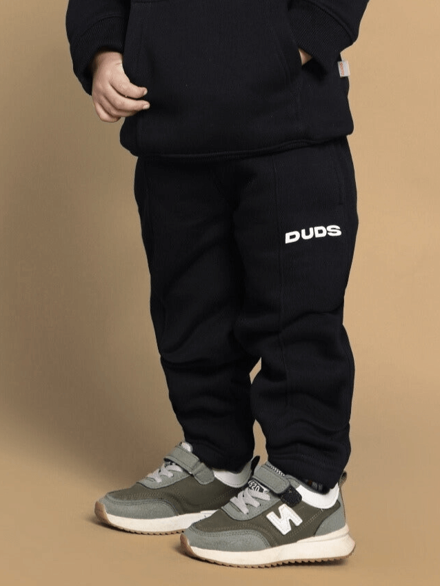 Kid wearing black BABLU DABLU co-ord set by DUDS, featuring customized fit option, tailored by experienced tailors, suitable for boys and girls.