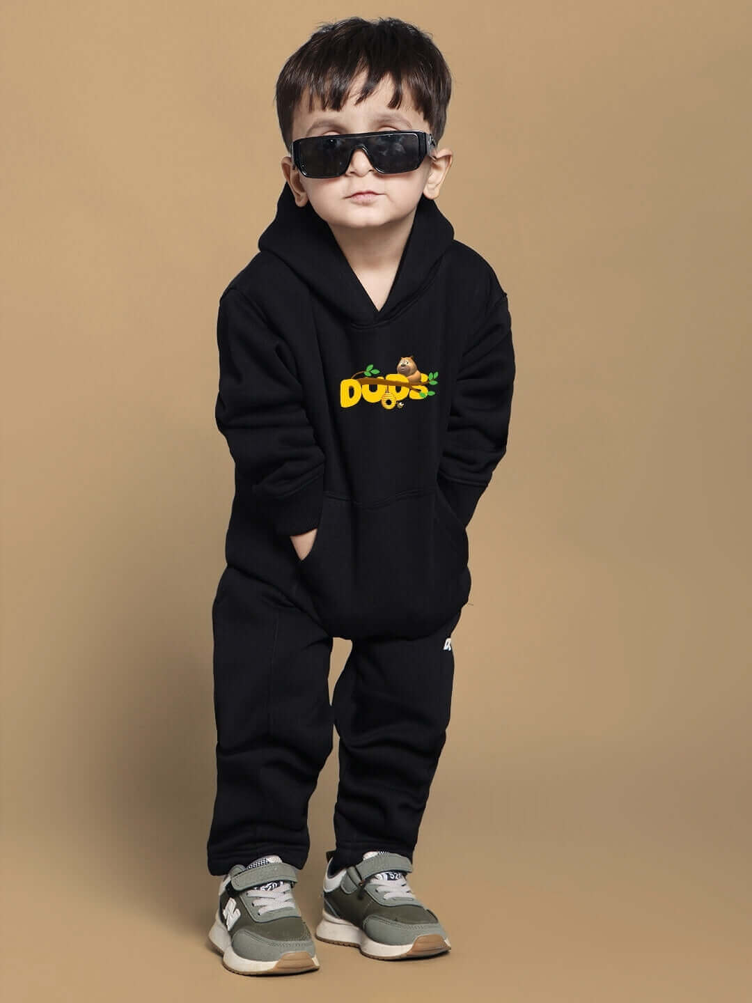 Black Bablu Dablu co-ord set for kids by DUDS, featuring a hoodie and pants, worn by a child with sunglasses.