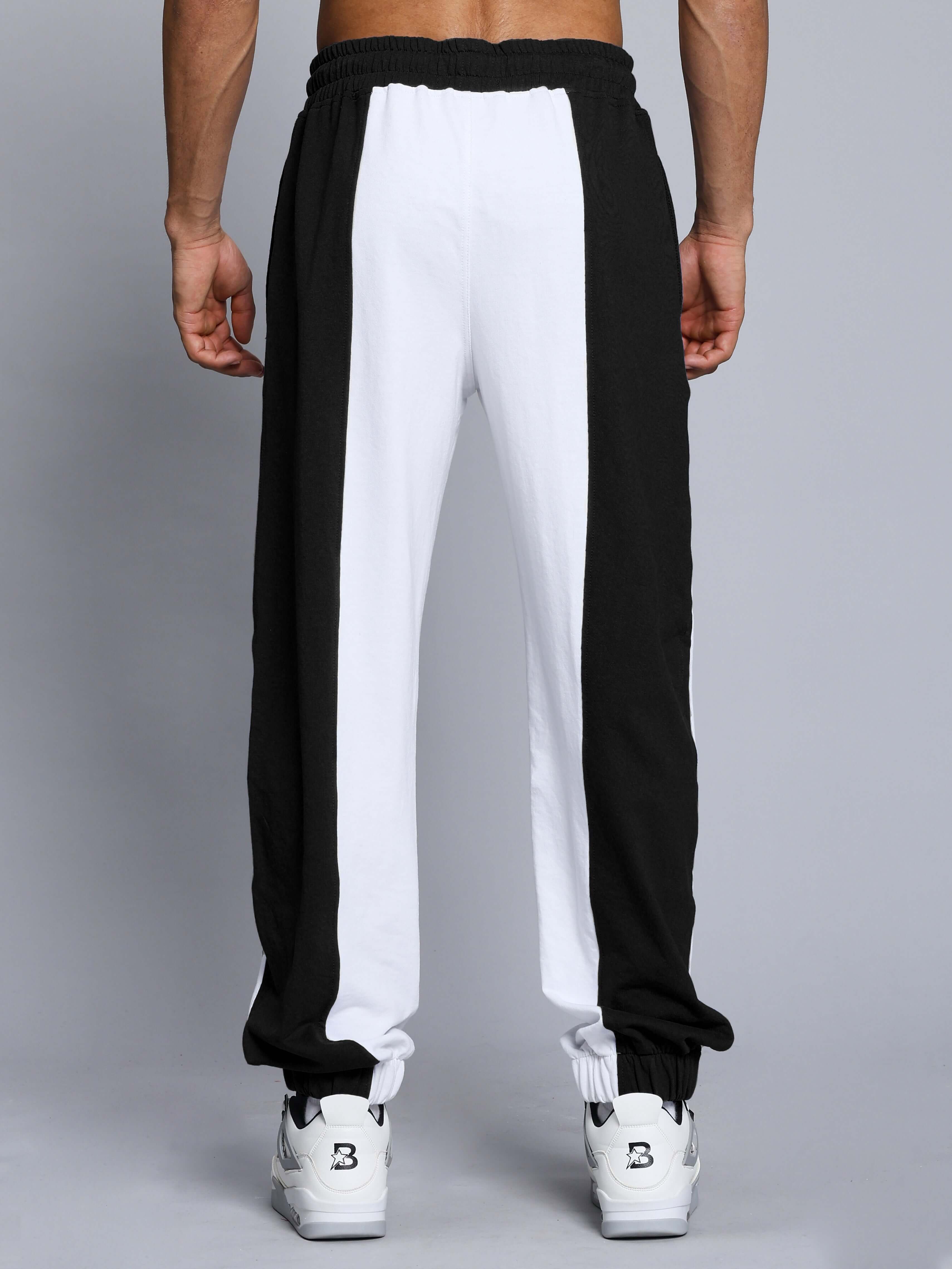 Back view of Balmy Relaxed Fit Jogger in white and black, showing two-tone design. Available for custom fit by DUDS, made to order.