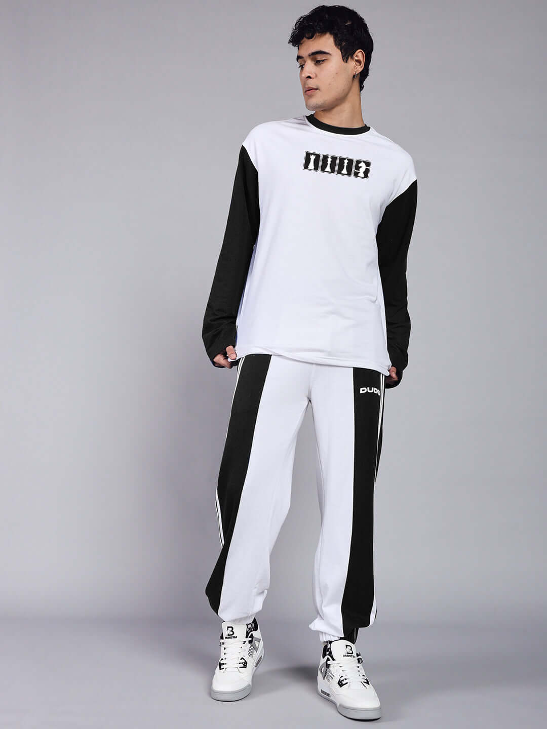 BALMY relaxed fit jogger in white-black by DUDS, modeled on a person, showcasing stylish comfort and casual fashion.
