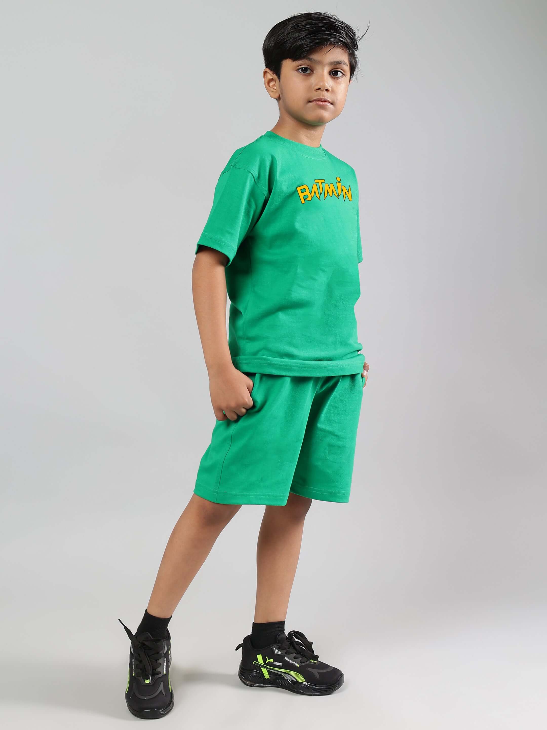 Child wearing BATMIN CO-ORD FOR BOYS GIRLS GREEN outfit with superhero style.