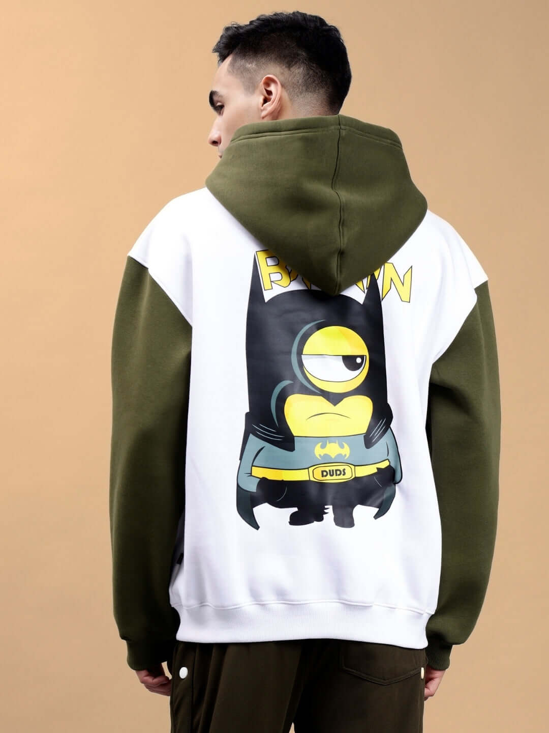 Rear view of BATMIN COLORBLOCK OVERSIZED FLEECE HOODIE WHITE-OLIVE GREEN with graphic design, worn by model.