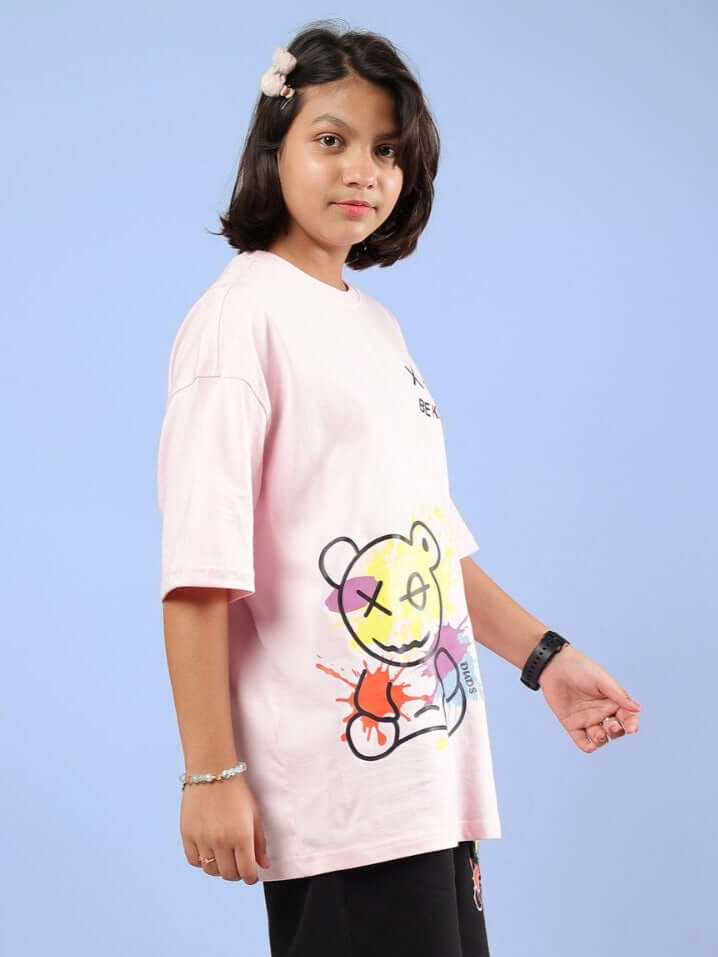 BE KIND OVERSIZED T-SHIRT FOR BOYS GIRLS PINK shown on child with colorful design.