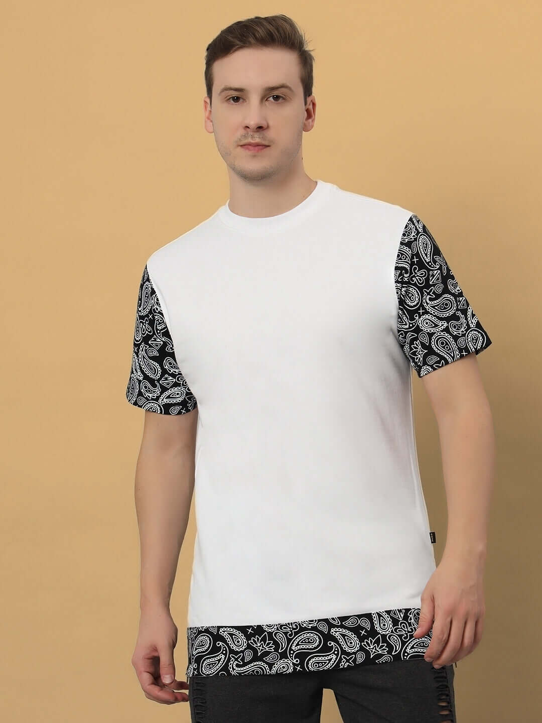 Model wearing BEASLEY OVER-SIZED T-SHIRT WHITE with paisley sleeves.