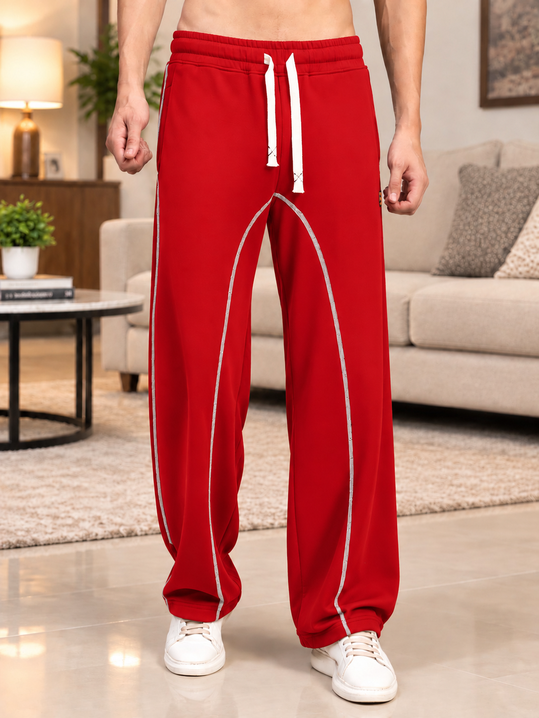 BEAT MODE FIT COTTON TERRY JOGGERS RED worn by a man in a cozy living room, stylish casual comfort fit