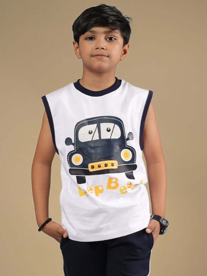 Boy wearing BEEP BEEP T-SHIRT FOR BOYS & GIRLS WHITE with cartoon car design, custom fit available, made by DUDS Tailors.