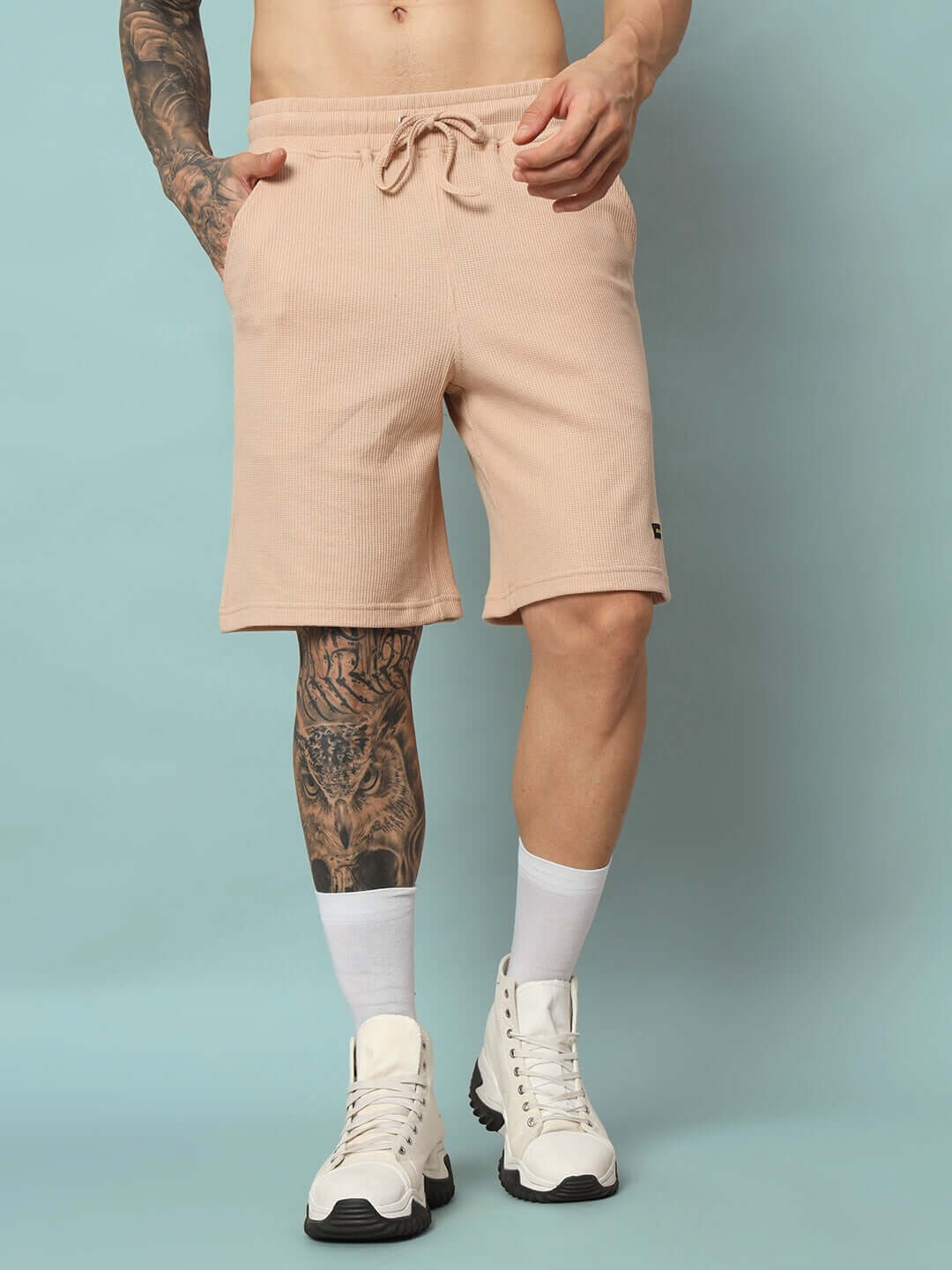 Beige waffle solid resort shirt co-ord set shorts modeled, featuring half sleeves, 100% cotton fabric, relaxed fit. Suitable for resort wear.
