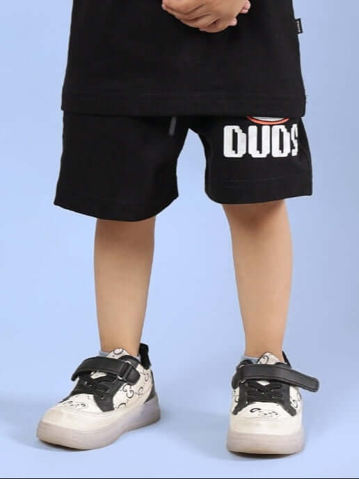 BINGO SHORTS FOR BOYS & GIRLS BLACK, children wearing black shorts with 'DUDS' print, available for custom fit orders from DUDS.