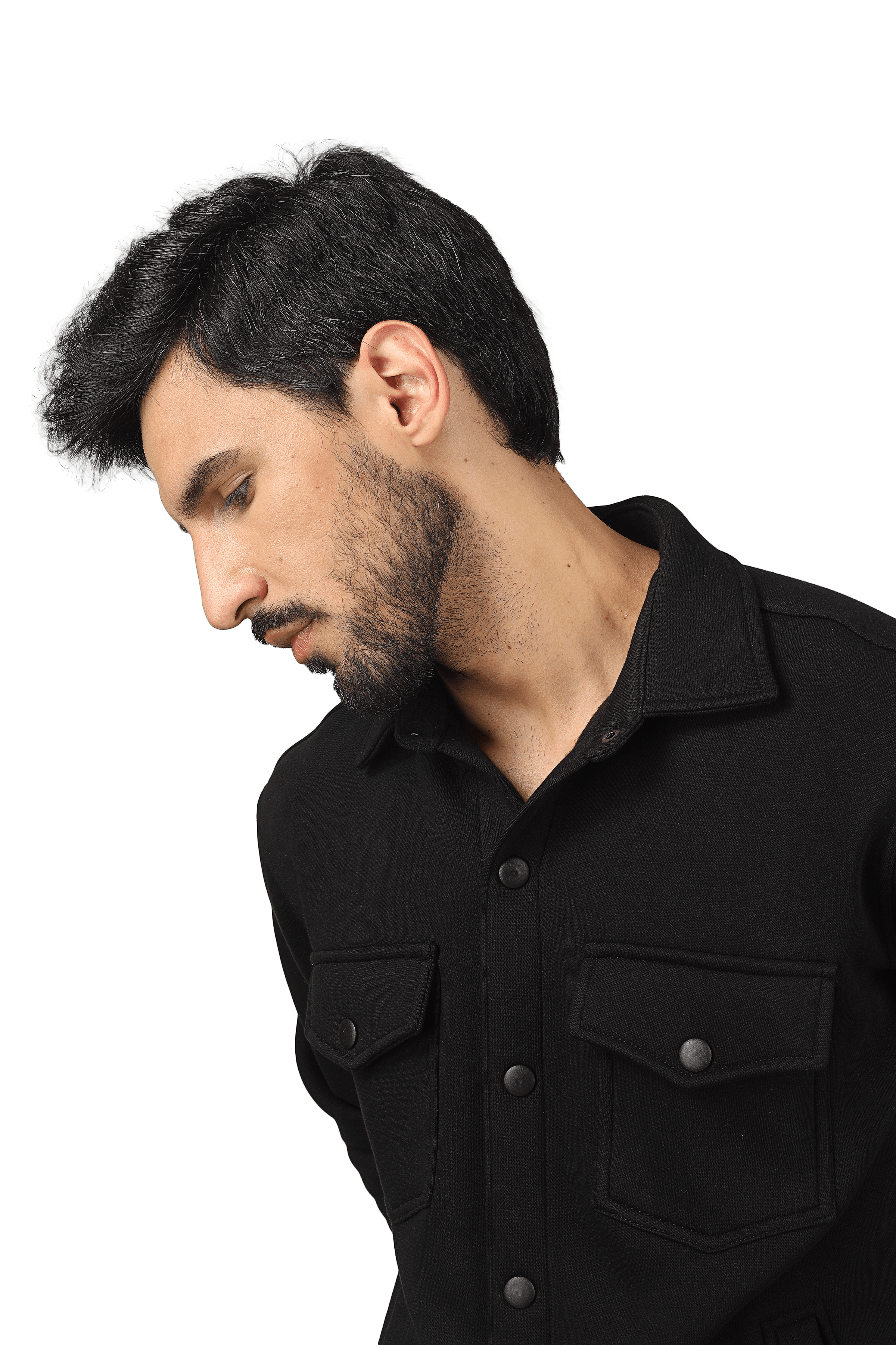 Man wearing black relaxed fit full-overshirt with buttoned pockets, showcasing streetwear style.