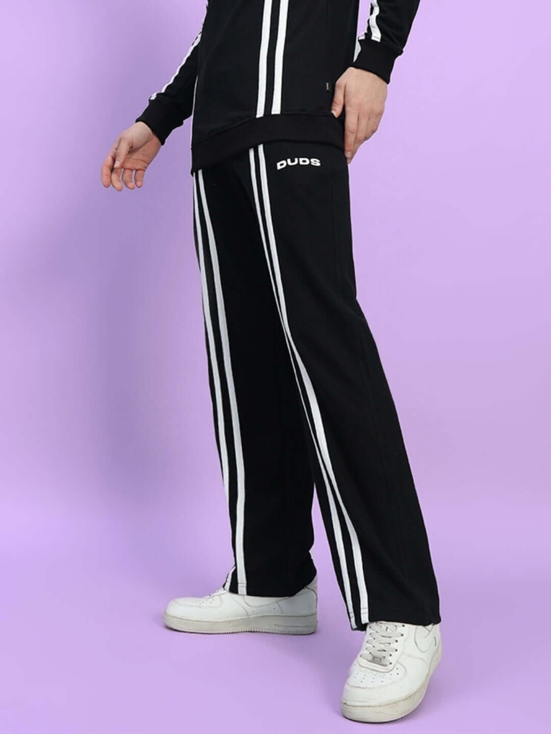Alt Tag: Black Outlook 2 Stripe Jogger by DUDS, featuring vertical white stripes, part of a made-to-order collection by skilled tailors.