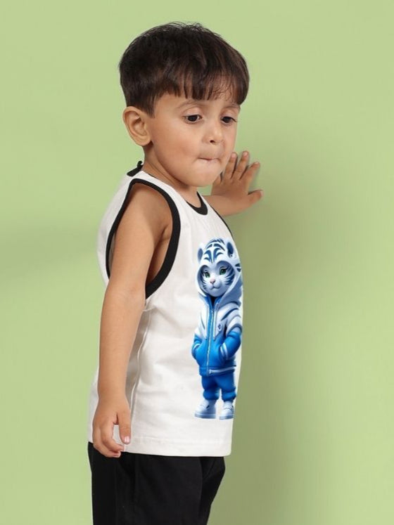 Child wearing Blue Cat summer t-shirt in off white with cat graphic, designed for boys and girls, against a light green background.