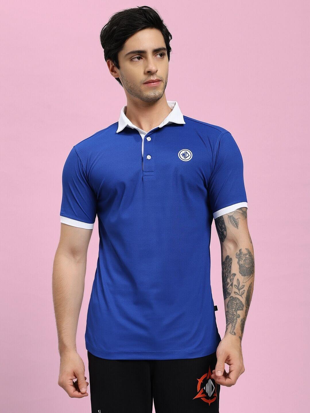 Man wearing EDGE POLO REGULAR FIT T-SHIRT BLUE with white trim and short sleeves, perfect for style and comfort.