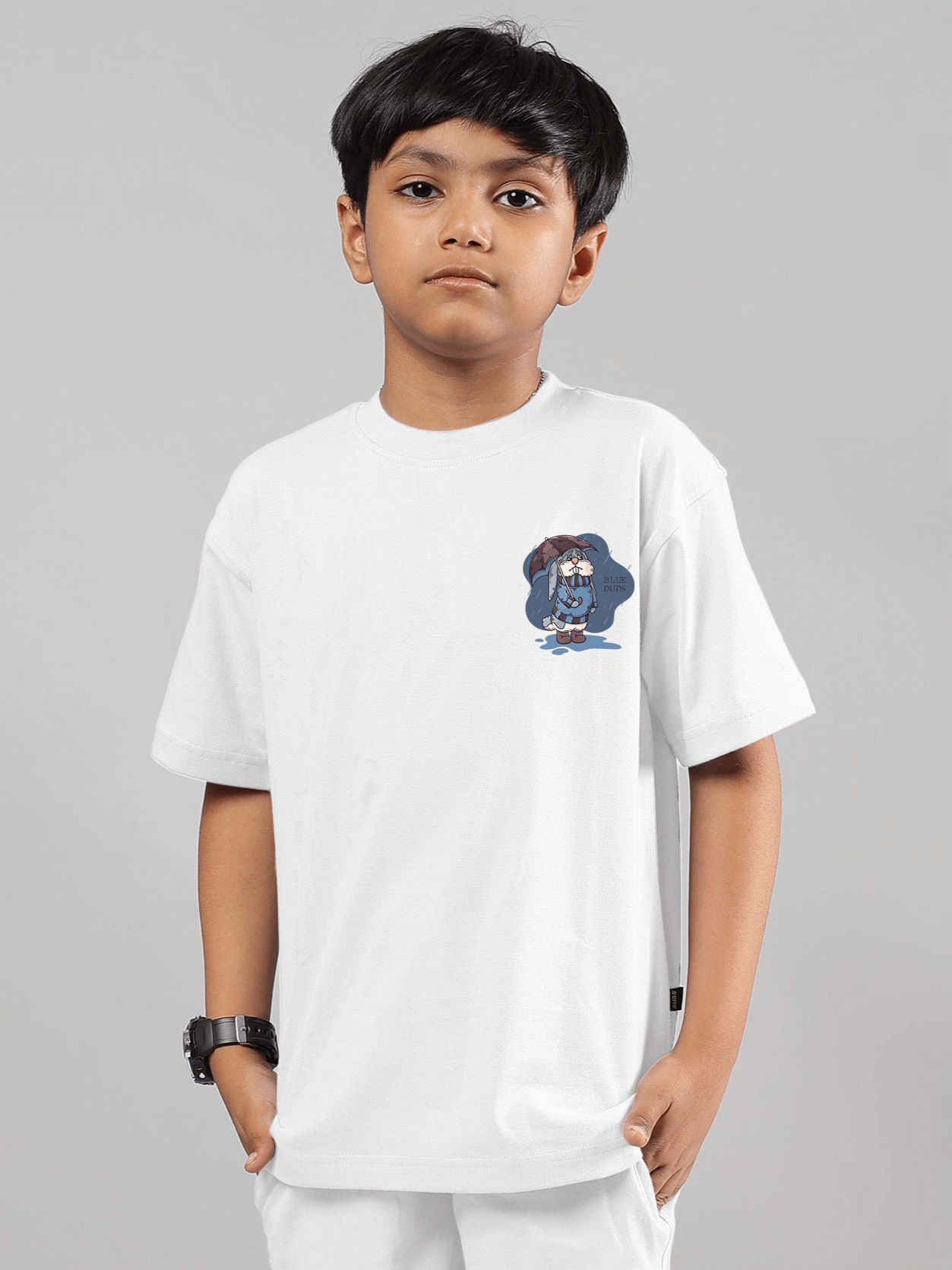 Boy wearing white Blue Lapin t-shirt for boys and girls by DUDS, featuring a cute lapin graphic on the chest.