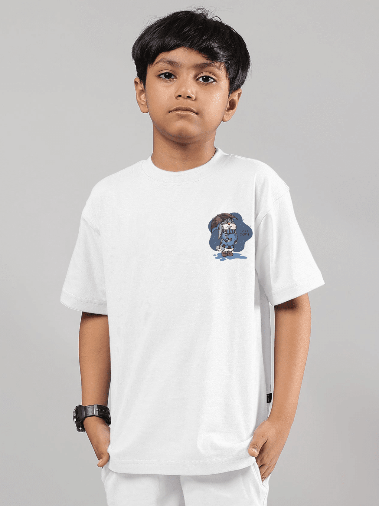 Child wearing BLUE LAPIN T-SHIRT FOR BOYS GIRLS WHITE, featuring playful graphic and comfortable cotton-blend fabric, perfect for kids.