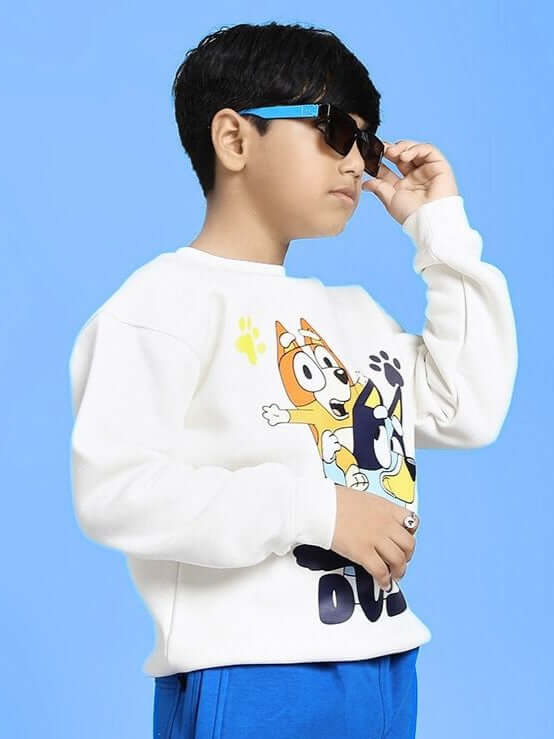 Child wearing BLUEY BINGO FLEECE SWEATSHIRT FOR BOYS AND GIRLS WHITE with sunglasses