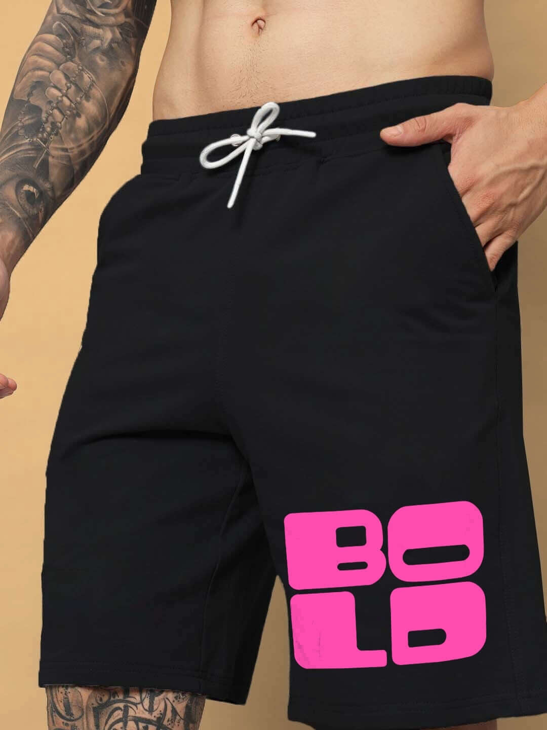 Black regular fit shorts featuring pink 'BOLD' text, customizable size options for a perfect fit.