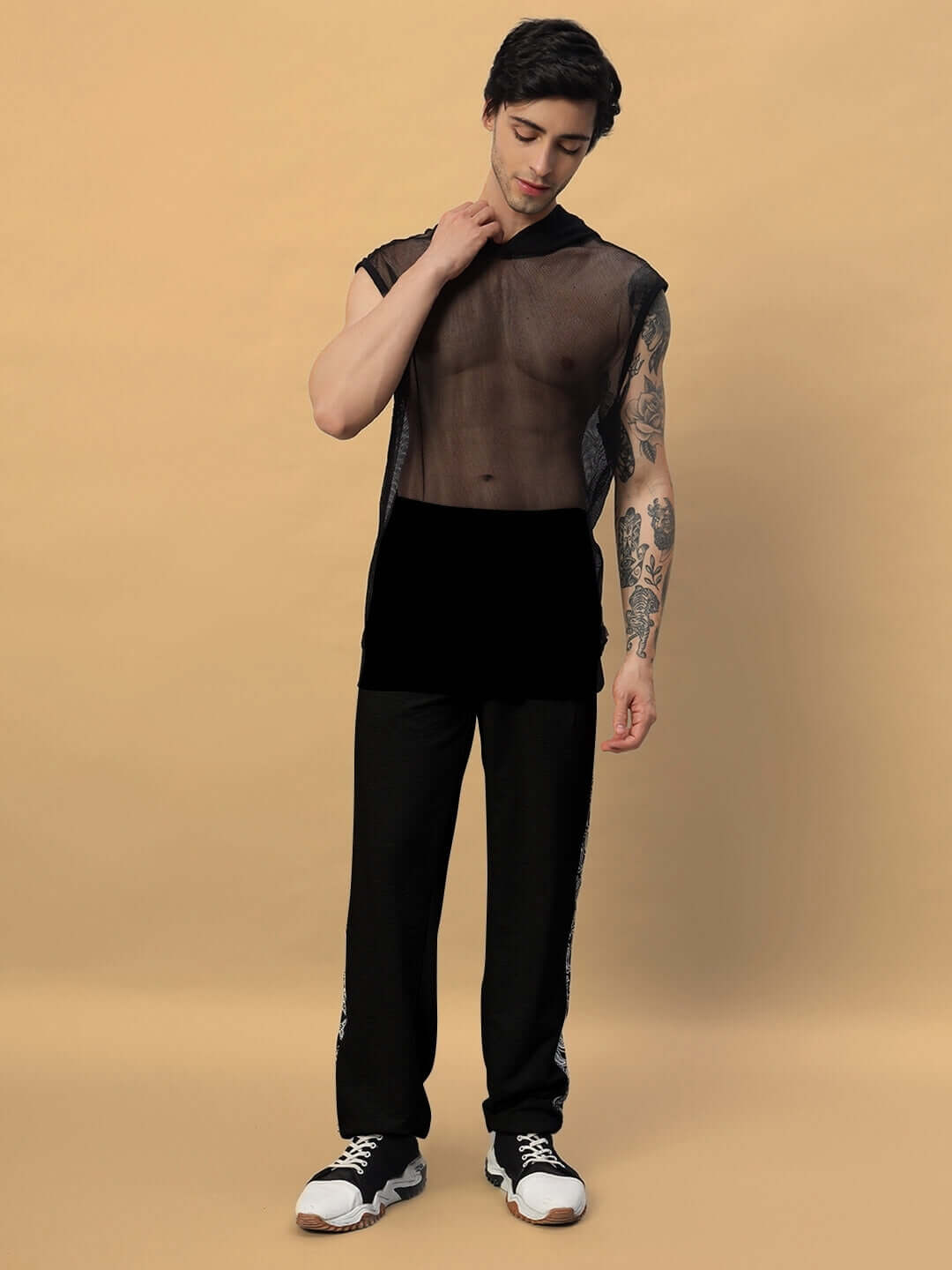 Model wearing Boogie Relaxed Fit Joggers in Black by DUDS, showcasing a casual and stylish look.