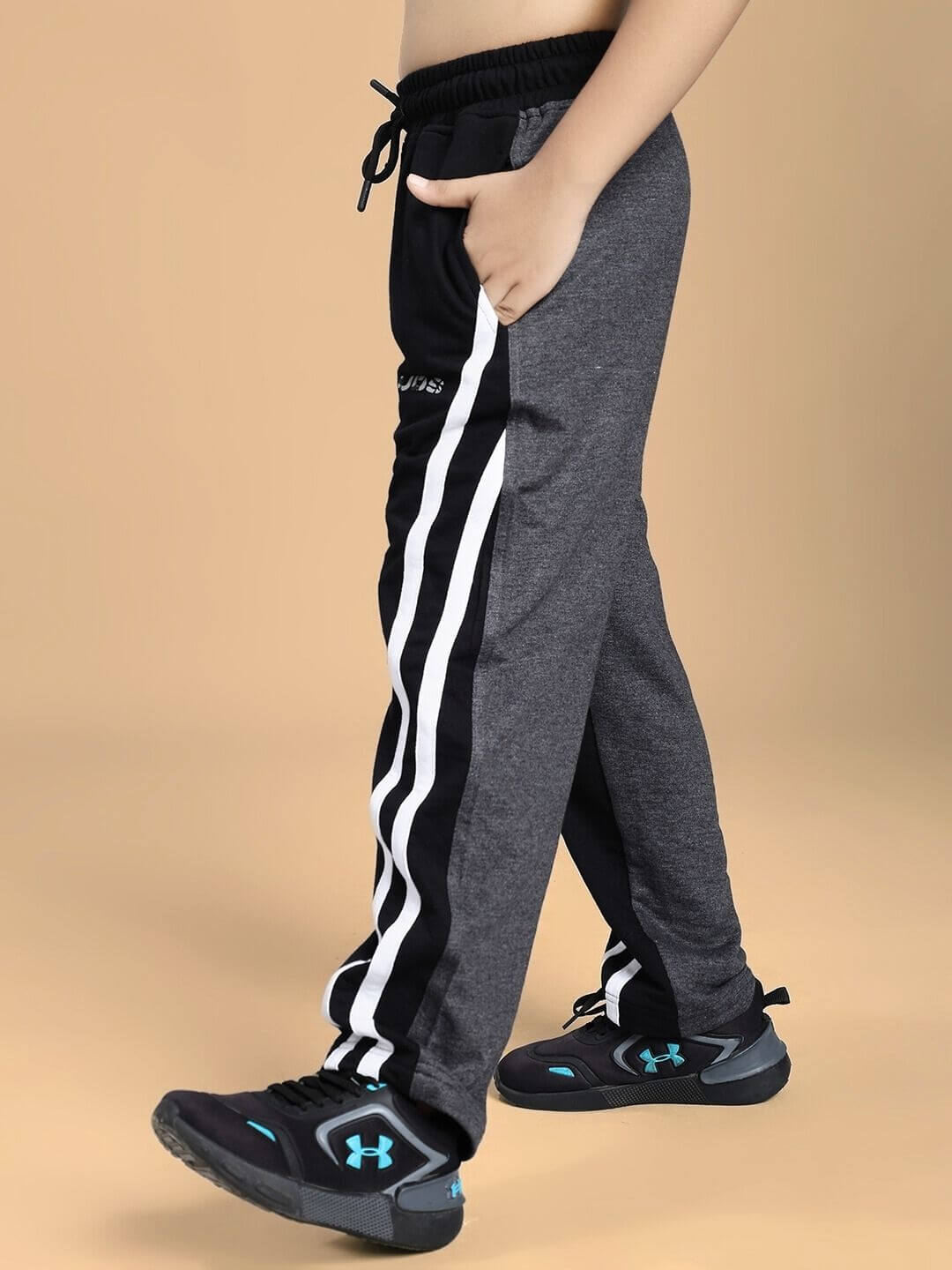 BOSCO STRIPE CO-ORD SET FOR BOYS AND GIRLS BLACK DARK GREY featuring trendy joggers and sneakers.