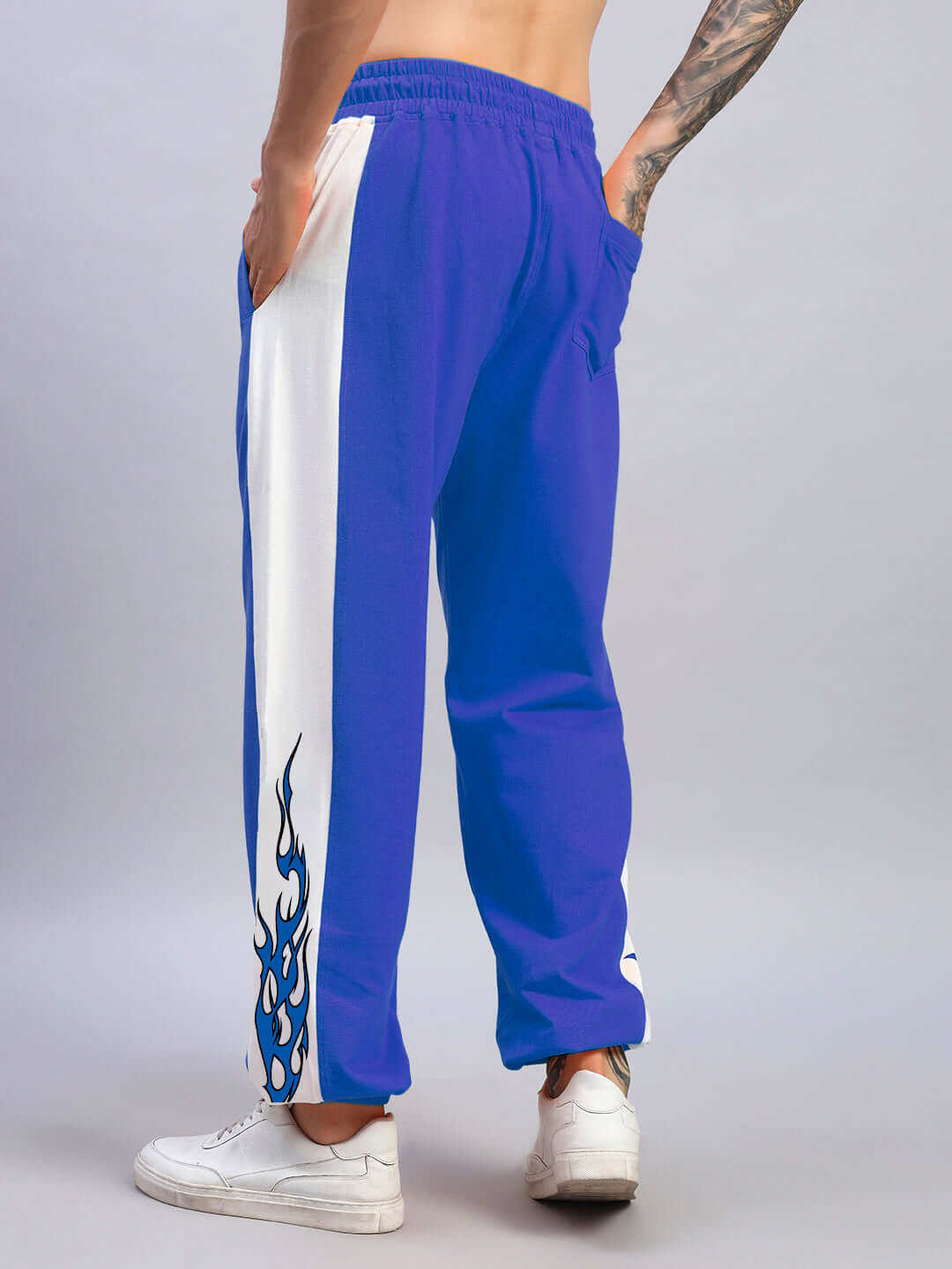 BRACER RELAXED FIT JOGGERS BLUE-WHITE displayed on model showing side view with stylish blue and white two-tone design