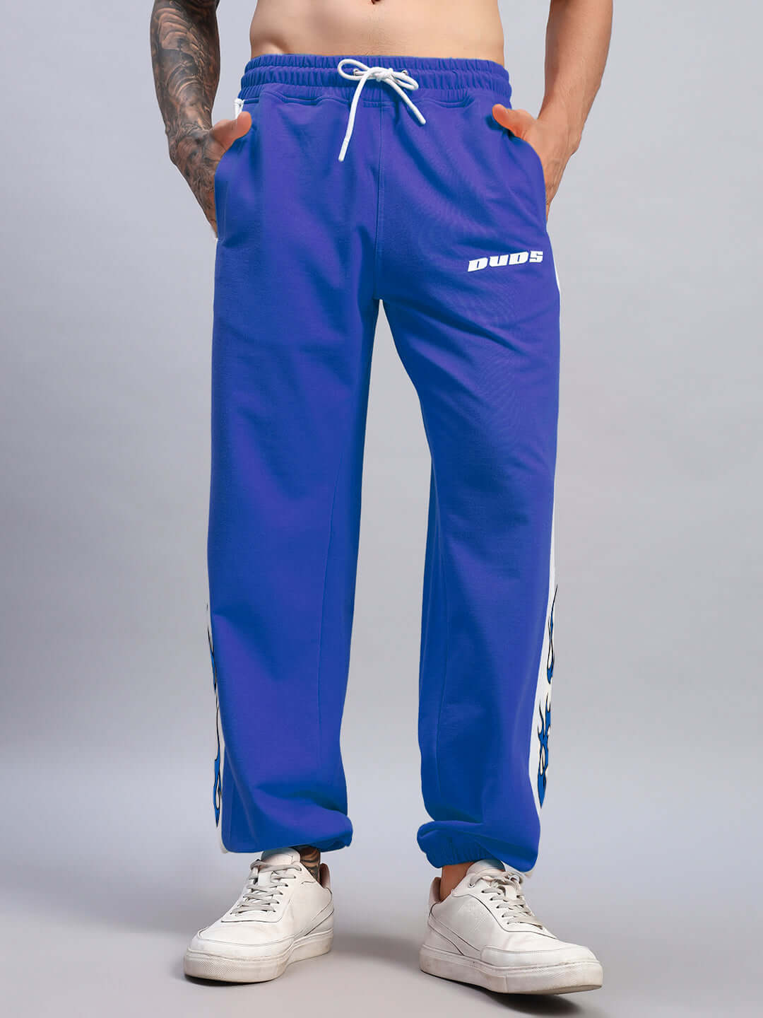 BRACER RELAXED FIT JOGGERS BLUE-WHITE with soft, breathable fabric, perfect for casual wear. Two-tone design enhances sporty look.