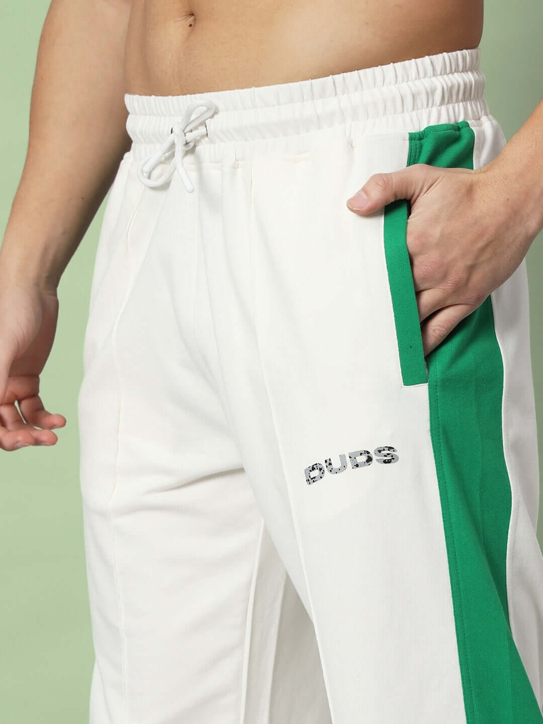 Breezer Side Contrast Joggers in off-white with green stripe by DUDS, featuring an elastic waistband and custom fit option.